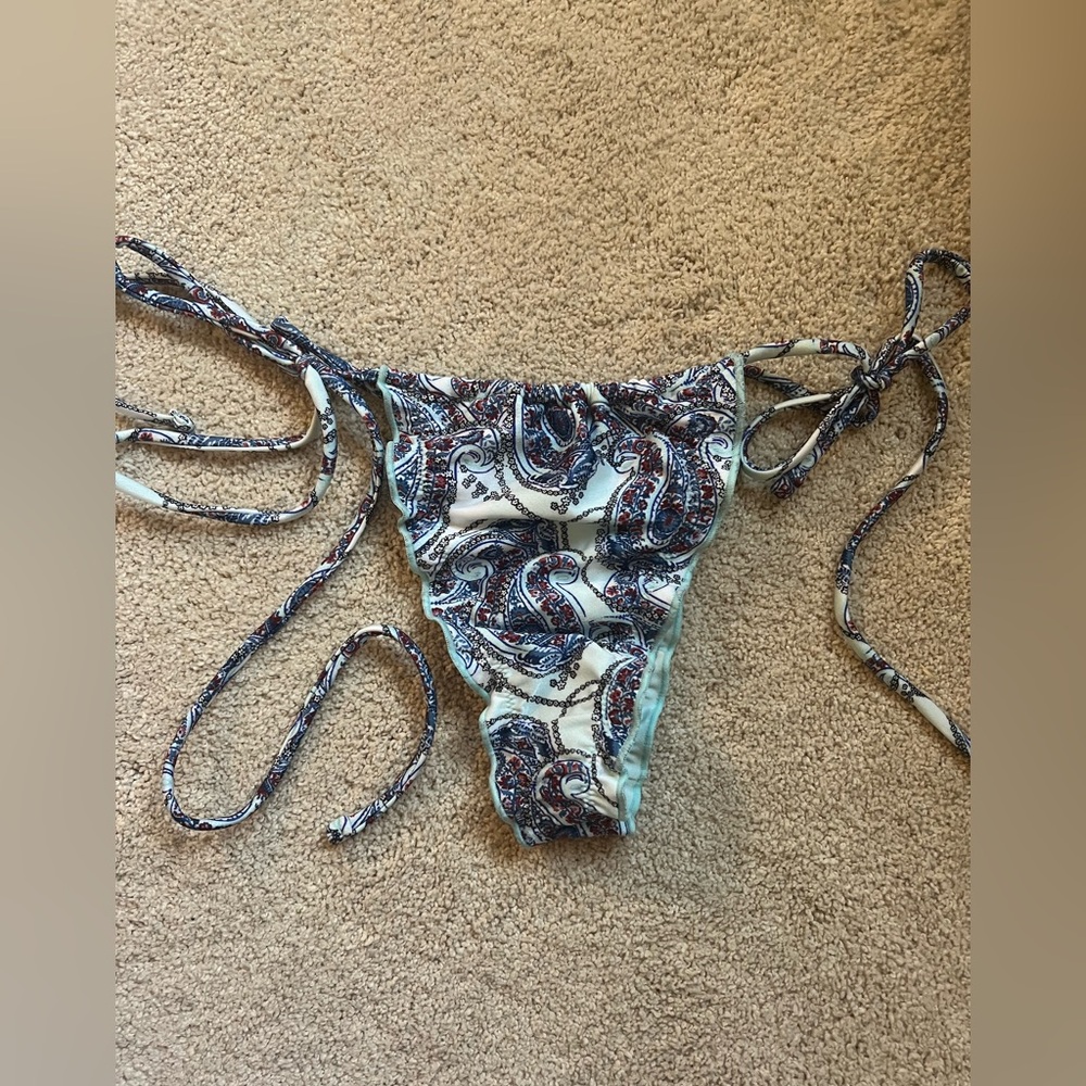Frankie’s Bikinis string bottoms
